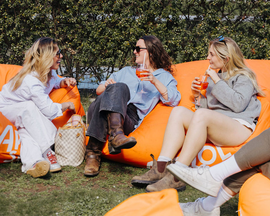 Girls in the garden enjoying Aperol Spritz